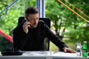 Ukraine's President Volodymyr Zelensky speaks on the phone during a meeting at the 6th European Political Community summit on May 16, 2025 at Skanderbeg Square in Tirana, Albania. The EPC brings together heads of state and government from the 27 European Union countries and 20 others. The items on today's agenda are security and democratic resilience, competitiveness and economic security, and mobility challenges and youth empowerment.